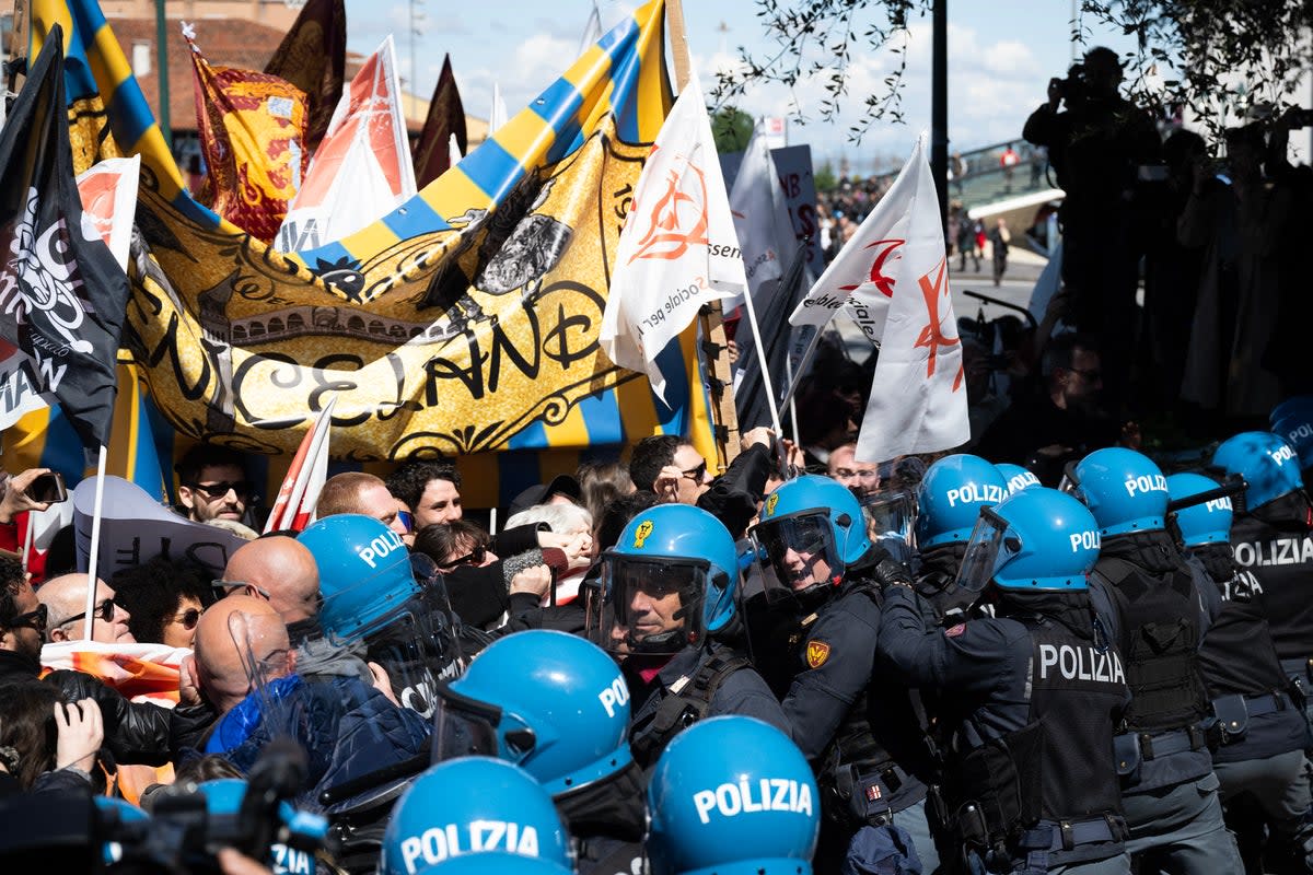 Protestors clash with police in Venice on April 25 (AFP via Getty Images)