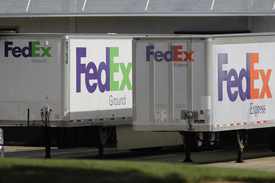 FedEx trailers are shown at a loading dock in Greensboro, N.C., Tuesday, June 25, 2019. FedEx is suing the United States government over export rules it says are virtually impossible to follow because it handles millions of packages a day. (AP Photo/Chuck Burton)