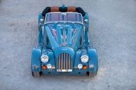 <p>There's nothing dynamic about the Morgan's aerodynamics. The windshield is flat, the doors are cut down to let air in, and great gobs of air get trapped under those glorious fenders.</p>