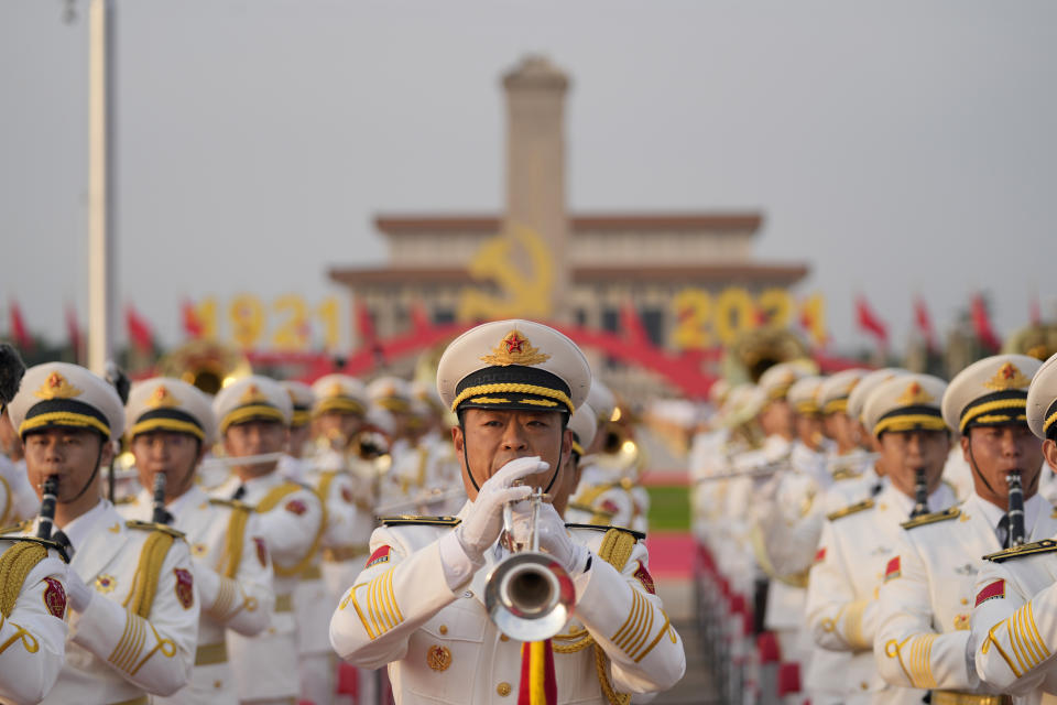 A military band rehearses for a ceremony to mark the 100th anniversary of the founding of the ruling Chinese Communist Party at Tiananmen Gate in Beijing Thursday, July 1, 2021. (AP Photo/Ng Han Guan)