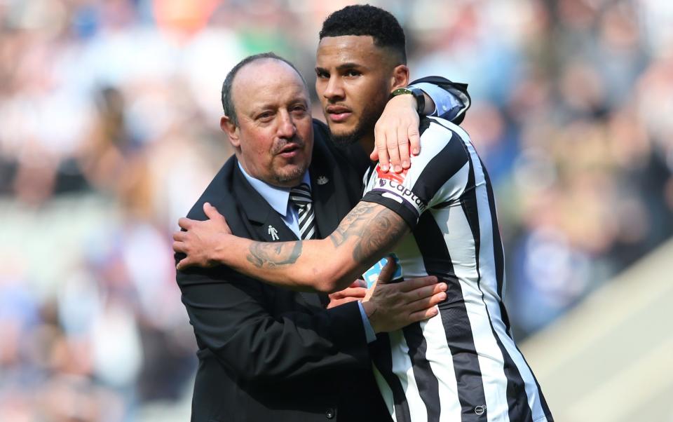 Rafael Benitez and Jamaal Lascelles hug each other