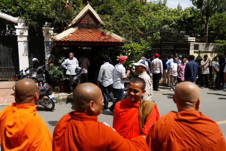 Supporters of Kem Sokha, leader of the now-dissolved Cambodia National Rescue Party (CNRP), gather in front of his home after he was released on bail, in Phnom Penh, Cambodia, September 10, 2018. REUTERS/Samrang Pring