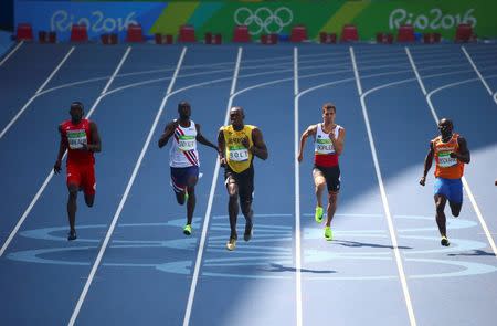 2016 Rio Olympics - Athletics - Preliminary - Men's 200m Round 1 - Olympic Stadium - Rio de Janeiro, Brazil - 16/08/2016. Kyle Greaux (TTO) of Trinidad and Tobago, Jaysuma Saidy Ndure (NOR) of Norway, Usain Bolt (JAM) of Jamaica, Jonathan Borlee (BEL) of Belgium and Solomon Bockarie (NED) of Netherlands compete. REUTERS/David Gray