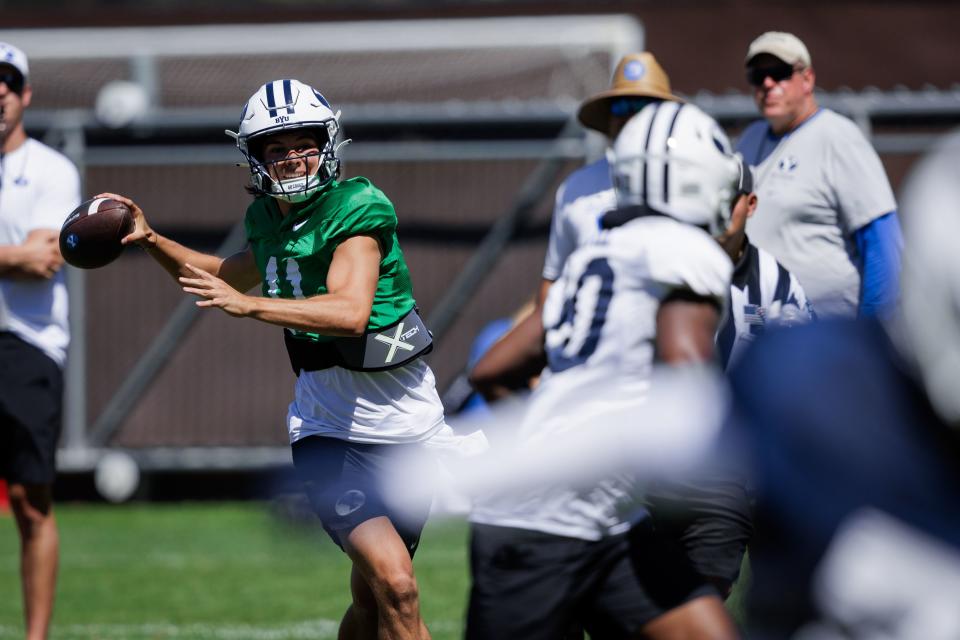 BYU quarterback Cade Fennegan (11) looks to throw downfield during practice in Provo on Thursday, Aug. 10, 2023. | BYU Photo