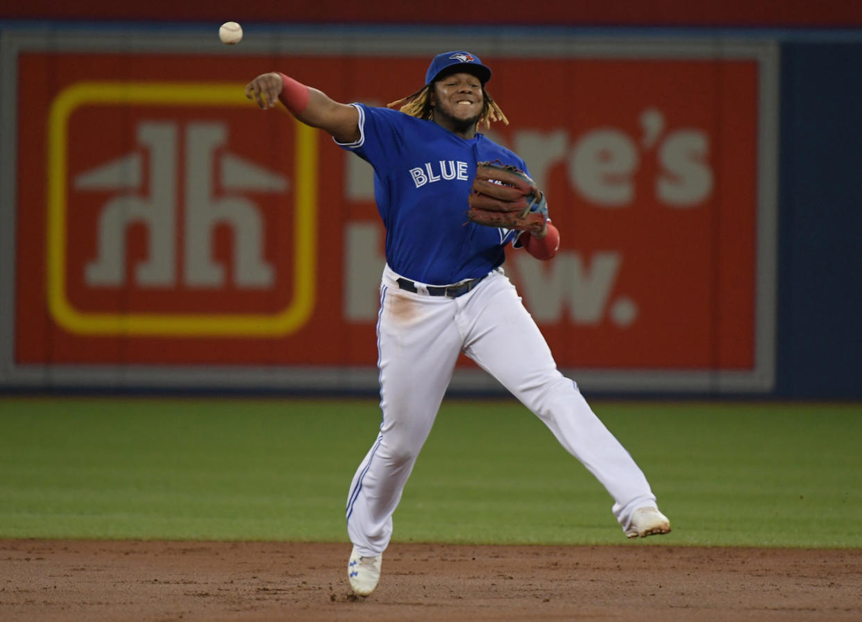 Toronto Blue Jays third baseman Vladimir Guerrero Jr. will undergo an MRI after leaving Saturday's game against the Seattle Mariners. (Dan Hamilton-USA TODAY Sports)