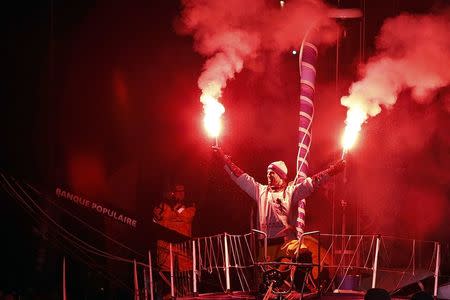 French skipper Armel Le Cleac'h reacts with flares to celebrate his winning the solo round-the-world Vendee Globe sailing race, as he arrives in the port of Les Sables d'Olonne on France's Atlantic coast January 19, 2017. REUTERS/Regis Duvignau