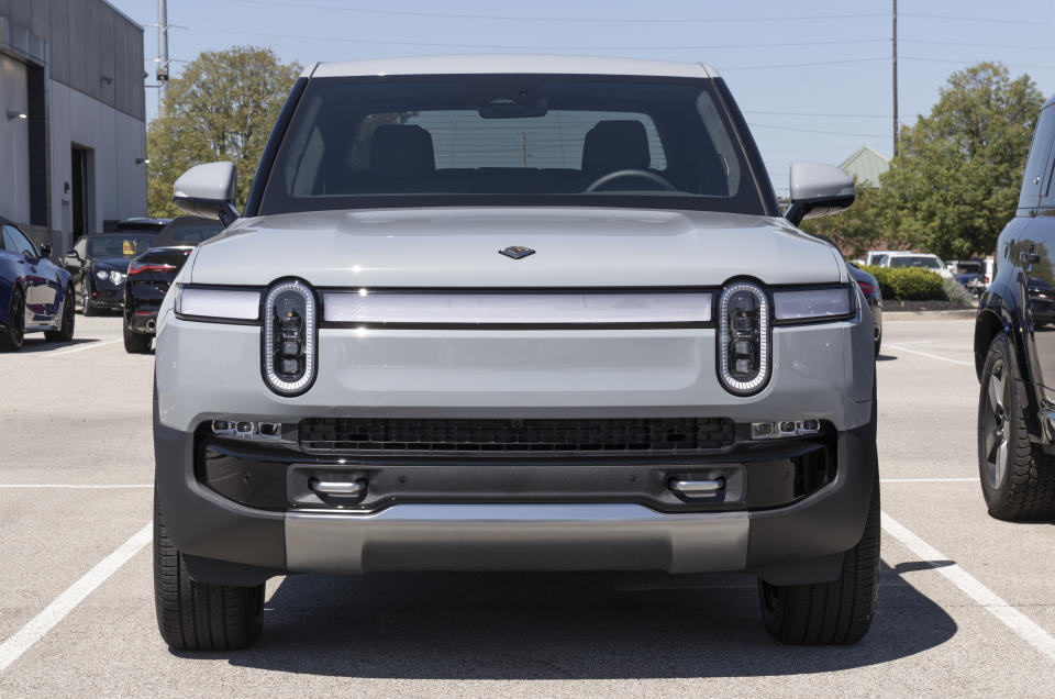 Indianapolis - Circa August 2022: Rivian R1T Pickup Truck display at a dealership. Rivian offers the R1T in Explore, Adventure and Launch models.