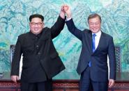 Relations have cooled since Kim Jong Un (L) and South Korea's President Moon Jae-in held their first meeting