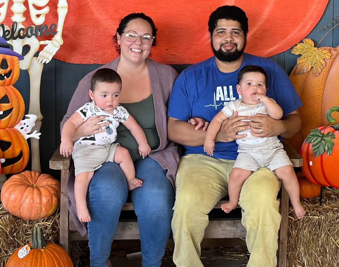 Leanne Font with her husband Amrin and their twins Joshua and Isaac. Season of Sharing helped the family with rent after the birth of their children kept Leanne from work.