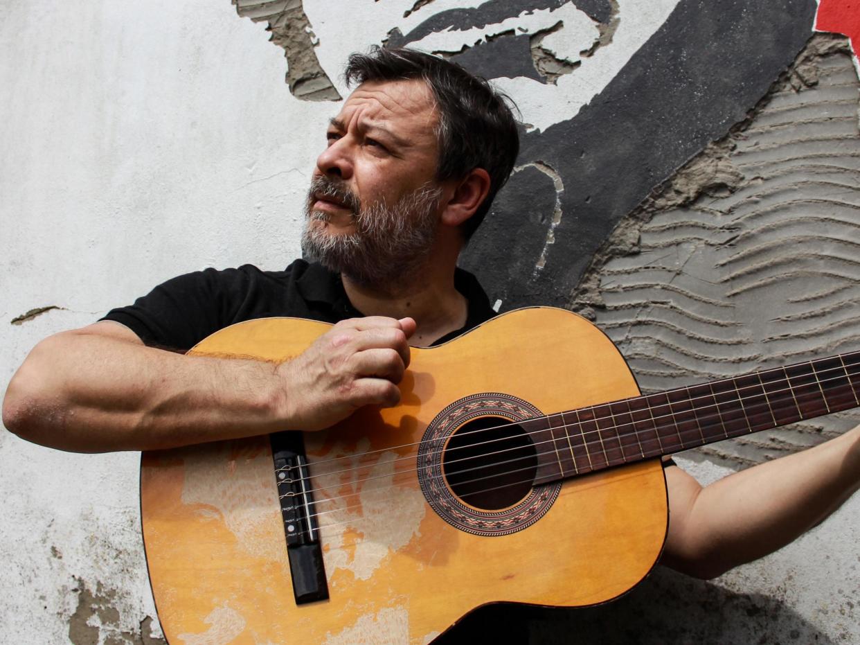 Bradfield next to the artwork for his first solo album in 14 years: James Dean Bradfield