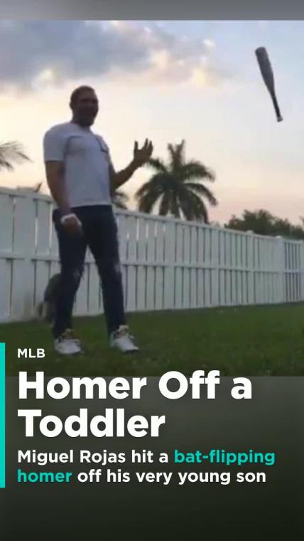 Miguel Rojas hit a bat-flipping homer off his very young son