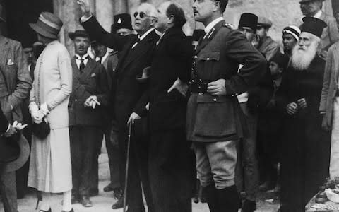Lord Arthur Balfour (1848 - 1930) points out a feature of the Church of the Holy Sepulchre to Governor Sir Ronald Storrs during a visit to Jerusalem, 9th April 1925 - Credit:  Topical Press Agency/Hulton Archive