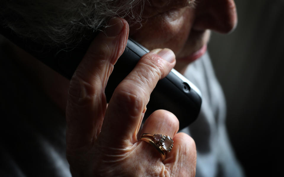 ILLUSTRATION - 11 October 2019, Bavaria, Würzburg: An elderly woman is using a cordless landline phone. Photo: Karl-Josef Hildenbrand/dpa (Photo by Karl-Josef Hildenbrand/picture alliance via Getty Images)