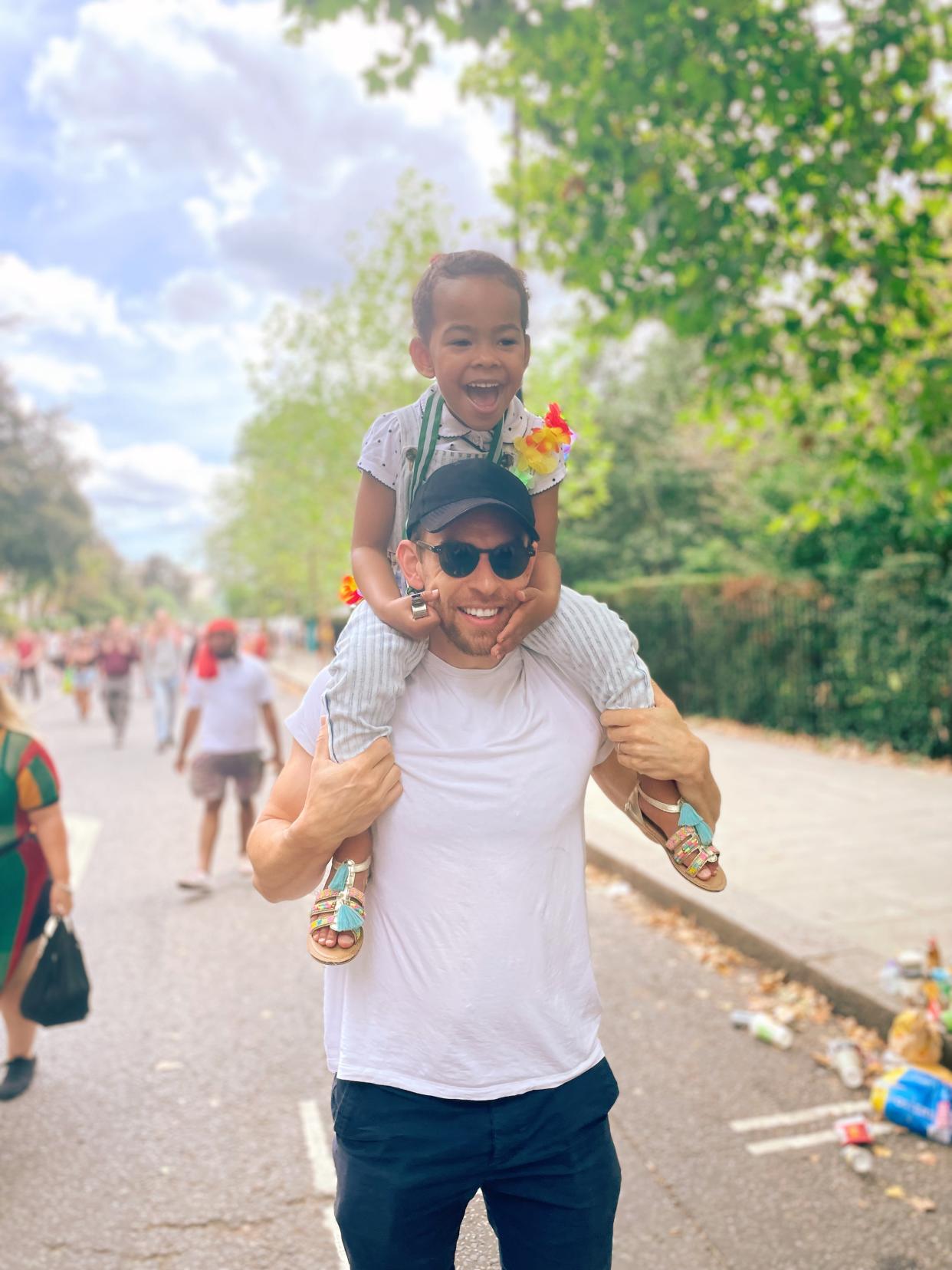 Man with girl on his shoulders