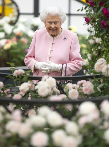 <p>RICHARD POHLE/POOL/AFP via Getty Images</p> Queen Elizabeth at the Chelsea Flower Show in London on May 21, 2018.