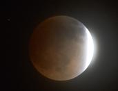 The moon is shown in eclipse from Los Angeles, California, late April 14, 2014. (REUTERS/Gene Blevins)