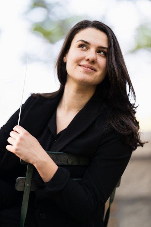 Shira Samuels-Shragg guest-conducts the South Bend Symphony Orchestra's performance of Sergei Prokofiev's "Peter and the Wolf" on Nov. 26, 2023, at the University of Notre Dame’s DeBartolo Performing Arts Center. The concert also features the experimental theater troupe Shades of Orange acting out the story.