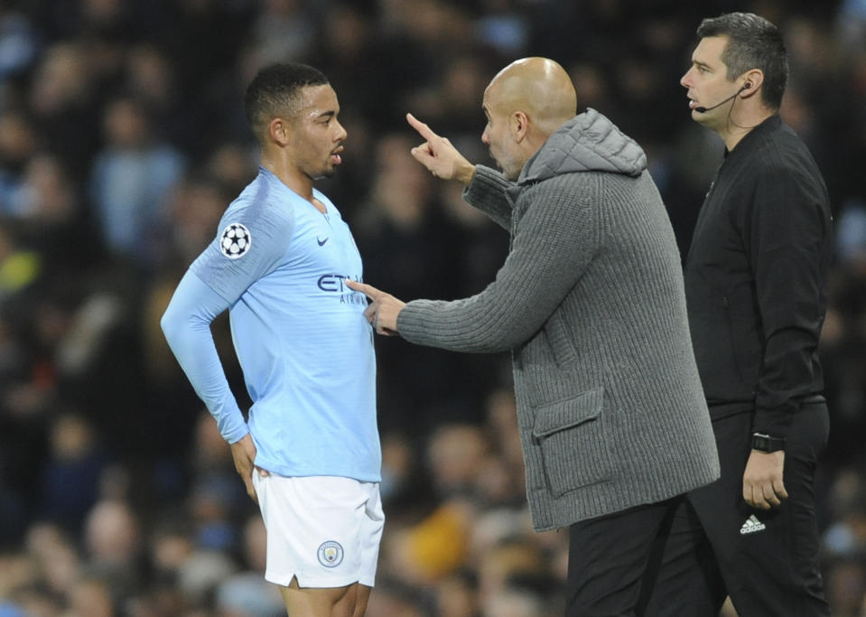 Manchester City coach Pep Guardiola gives instructions to Manchester City forward Gabriel Jesus during the Champions League Group F soccer match between Manchester City and Shakhtar Donetsk at Etihad stadium in Manchester, England, Wednesday, Nov. 7, 2018. (AP Photo/Rui Vieira)