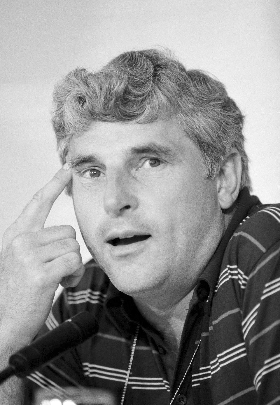 FILE - U.S. Olympic men's basketball coach Bob Knight talks during a news conference in July 1984 in Los Angeles. Knight, the brilliant and combustible coach who won three NCAA titles at Indiana and for years was the scowling face of college basketball, has died. He was 83. Knight's family made the announcement on social media on Wednesday night, Nov. 1, 2023, saying he was surrounded by family members at his home in Bloomington, Ind. (AP Photo/Lenny Ignelzi)