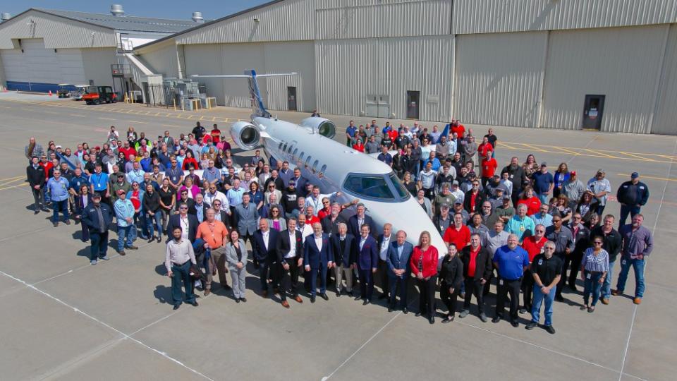 Surrounded by workers and executives, the last Learjet 75 was delivered to Northern Jet Management. The ceremony was the end of the brand. - Credit: Courtesy Bombardier