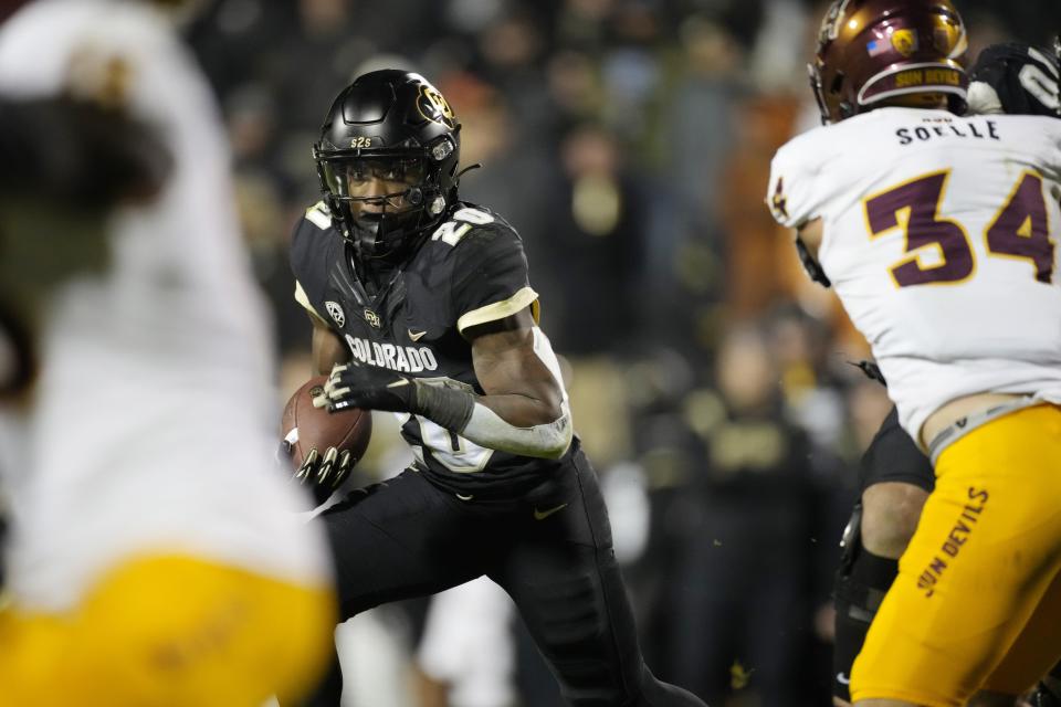 Colorado running back Deion Smith looks for a lane during game Saturday, Oct. 29, 2022, against Arizona State in Boulder, Colo. Smith transferred to BYU in the offseason. | David Zalubowski, Associated Press