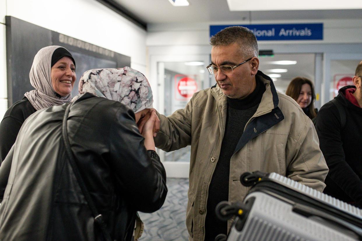 Sarah Shannan greets her father Ayman Shannan as her mother Mona watches after arriving at Detroit Metro Airport in Romulus from Gaza on Wednesday, March 27, 2024.