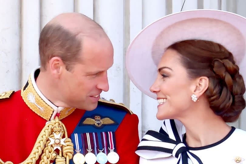 Prince William, Prince of Wales and Catherine, Princess of Wales on the balcony during Trooping the Colour at Buckingham Palace on June 15, 2024 in London, England.