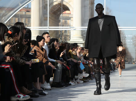 A model presents a creation by Bottega Veneta during the Milan Fashion Week in Milan, Italy February 22, 2019. REUTERS/Alessandro Garofalo