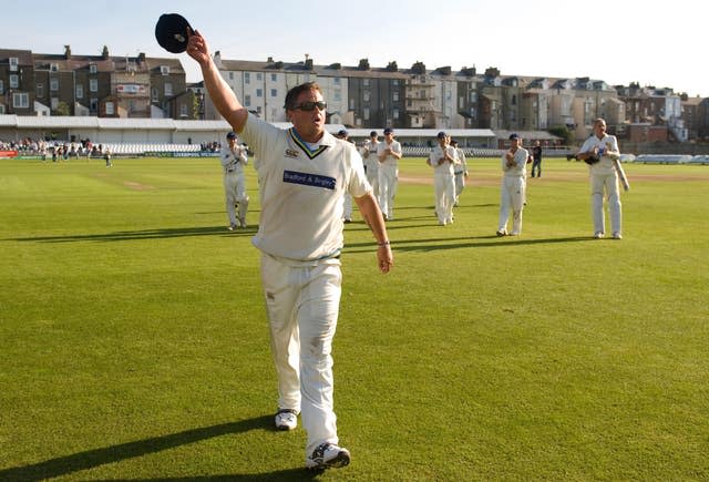 Darren Gough leaves the field with Yorkshire.