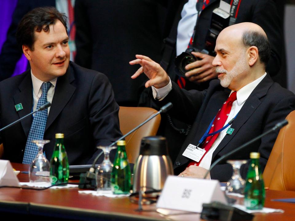 Federal Reserve Chairman Ben Bernanke, right, talks with British Chancellor of the Exchequer George Osborne during a G-20 finance ministers and central bank governors meeting, Friday, April 20, 2012, at the IMF and World Bank Group Spring Meetings in Washington. ()