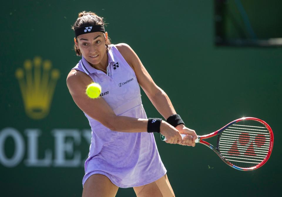 Carolina Garcia of France hits to Leylah Fernandez of Canada during their third-round match at the BNP Paribas Open at the Indian Wells Tennis Garden in Indian Wells, Calif., Monday, March 13, 2023. 