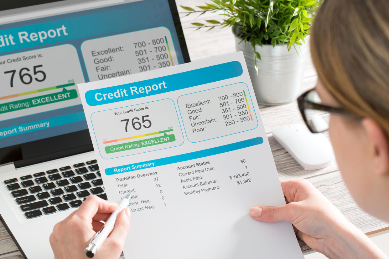 Checking your credit report for errors is a key component of financial health. (Photo: Getty)