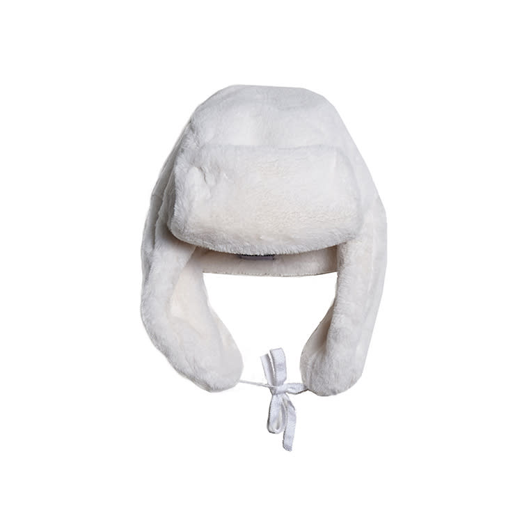 <p>This faux fur hat looks super luxe and will be sure to keep you warm. The ear flaps can be tied up or left hanging, which we love.</p><p>Buy it <a rel="nofollow noopener" href="https://houseoffluff.com/collections/autumn-winter-2017-collection/products/white-explorers-hat" target="_blank" data-ylk="slk:here;elm:context_link;itc:0;sec:content-canvas" class="link ">here</a> for $125.</p>