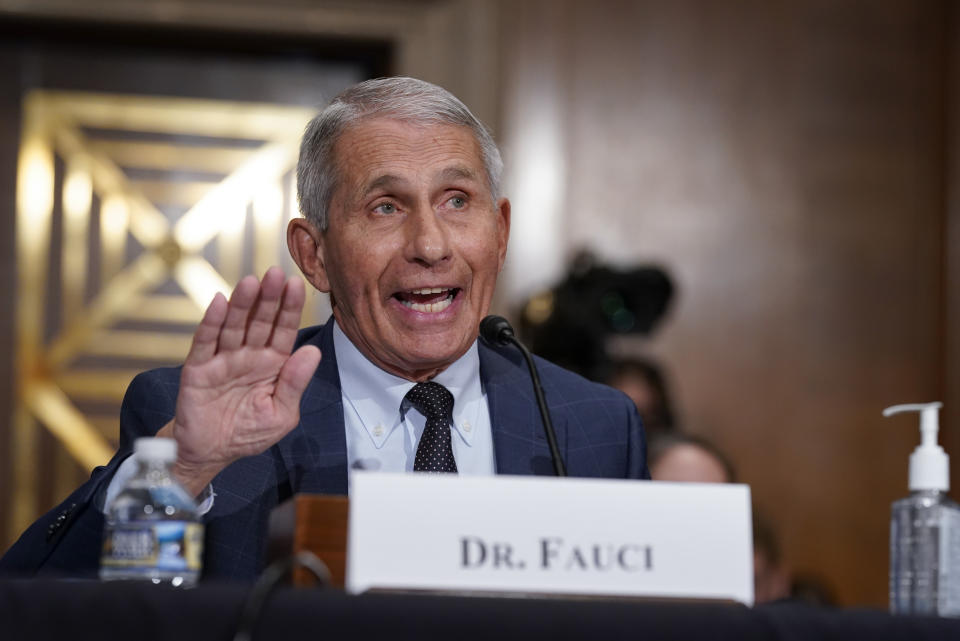 Top infectious disease expert Dr. Anthony Fauci responds to accusations by Sen. Rand Paul, R-Ky., as he testifies before the Senate Health, Education, Labor, and Pensions Committee, on Capitol Hill in Washington, Tuesday, July 20, 2021. Cases of COVID-19 have tripled over the past three weeks, and hospitalizations and deaths are rising among unvaccinated people. (AP Photo/J. Scott Applewhite, Pool)