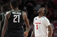 Houston's Ja'Vier Francis (5) celebrates during the second half of an NCAA college basketball game against Central Florida Saturday, Jan. 20, 2024, in Houston. (AP Photo/David J. Phillip)