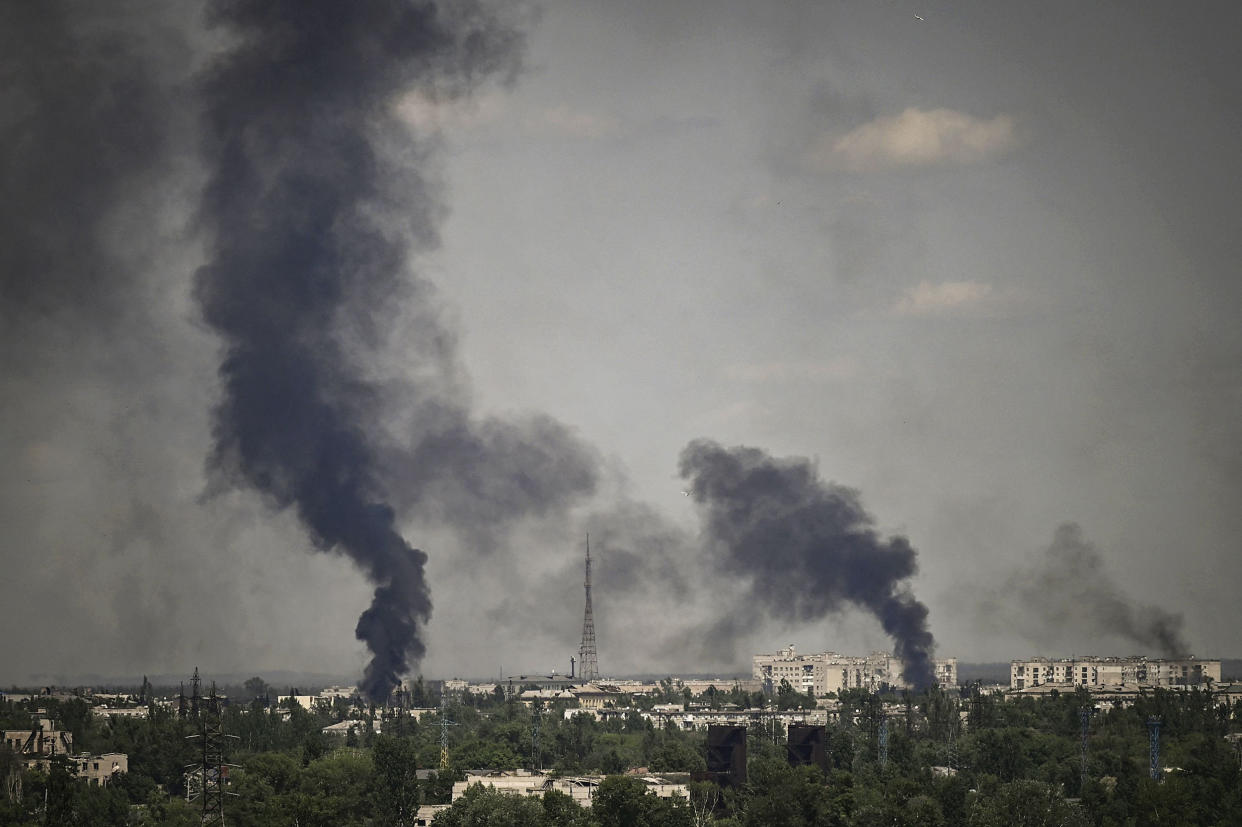 Smoke rises in the city of Severodonetsk during heavy fighting between Ukrainian and Russian troops in the Donbas region on May 30, 2022. (Aris Messinis / AFP - Getty Images)