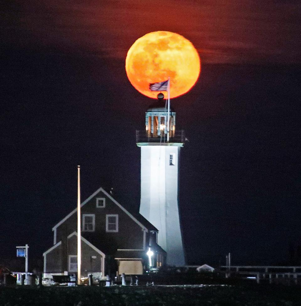 A full Worm Moon rises over Scituate, Massachusetts on March 18, 2022.
