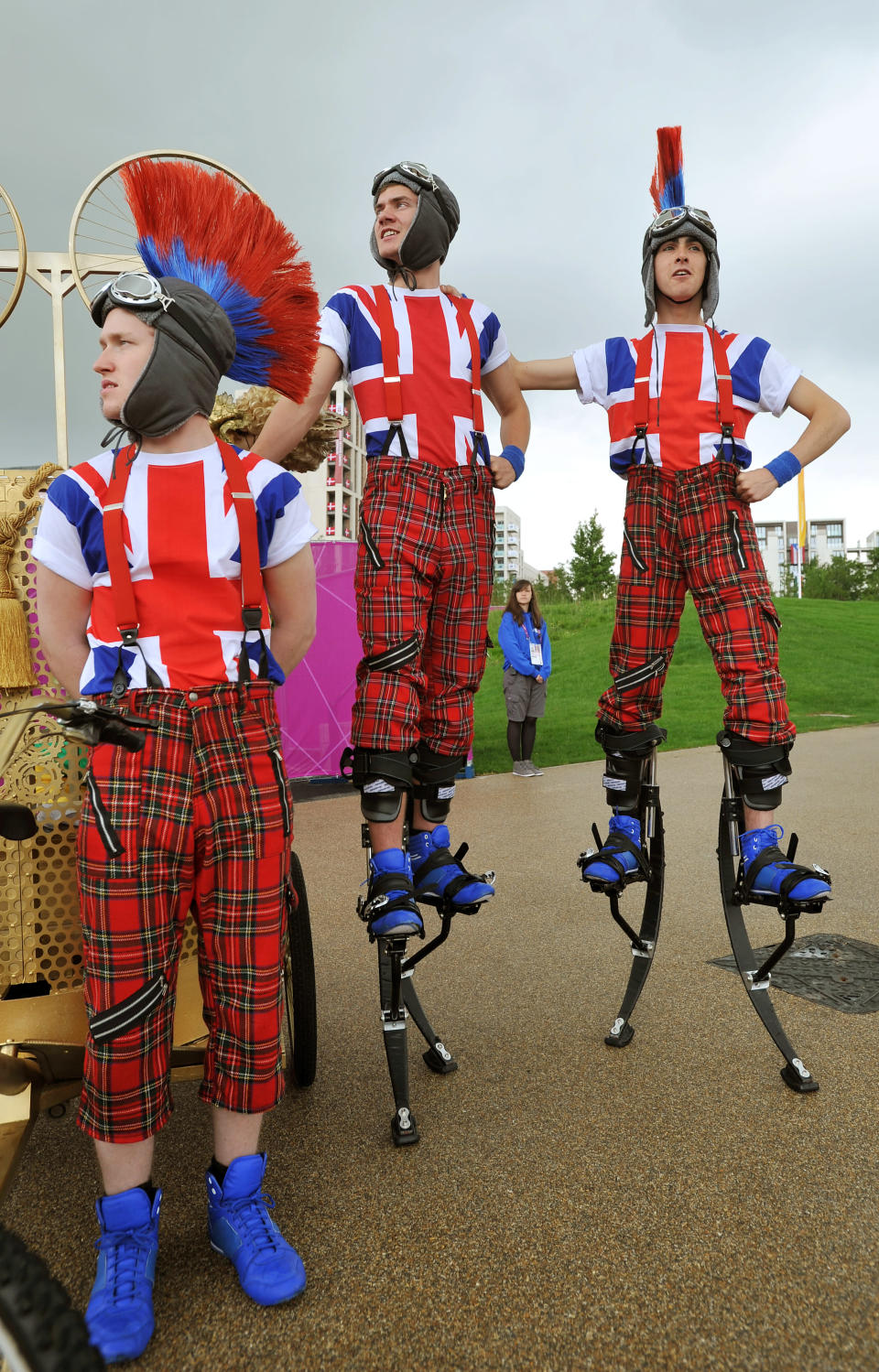 The sight that greets arriving Athletes at their Olympic Village, where members of the National Youth Theatre of Britain welcome them with song and dance routines, on July 20, 2012 in London, England. The opening ceremony of the games will take place in seven days. (John Stillwell - WPA Pool /Getty Images)