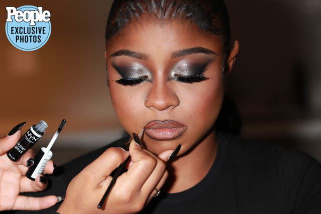 <p>Backgrid</p> Reginae Carter gets ready for the NYX Professional Makeup Mon-Stars Halloween bash