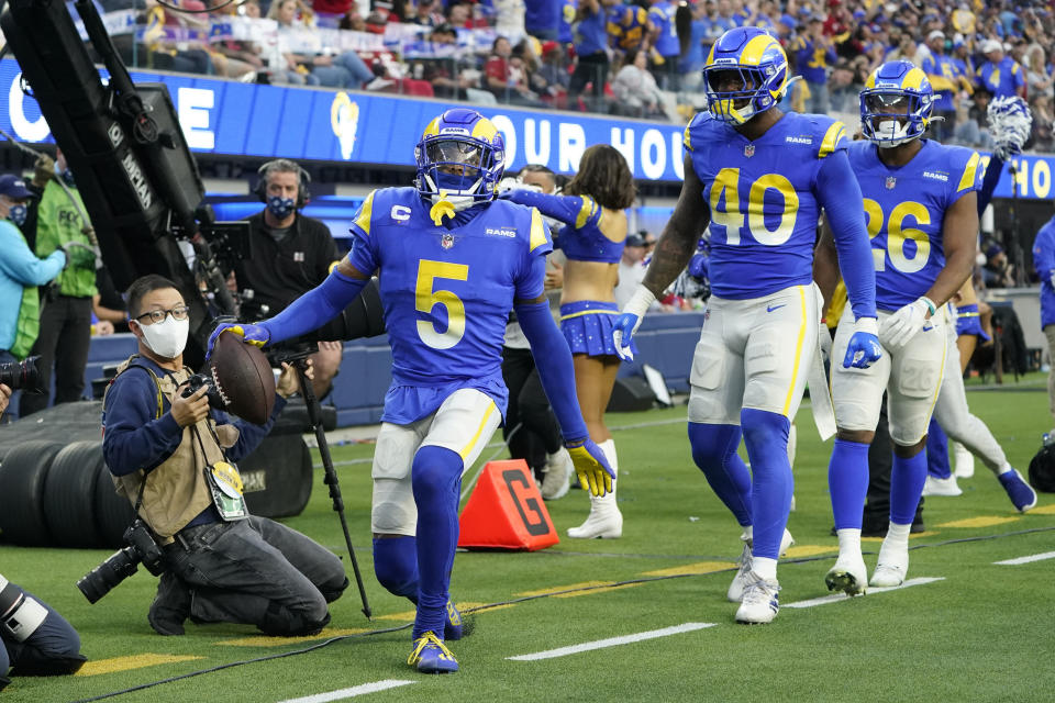 Los Angeles Rams cornerback Jalen Ramsey (5) celebrates after intercepting a pass during the second half of an NFL football game against the San Francisco 49ers, Sunday, Jan. 9, 2022, in Inglewood, Calif. (AP Photo/Marcio Jose Sanchez)