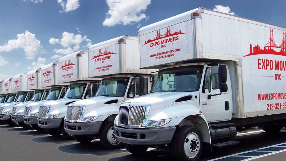 A fleet of trucks for Expo Movers and Storage