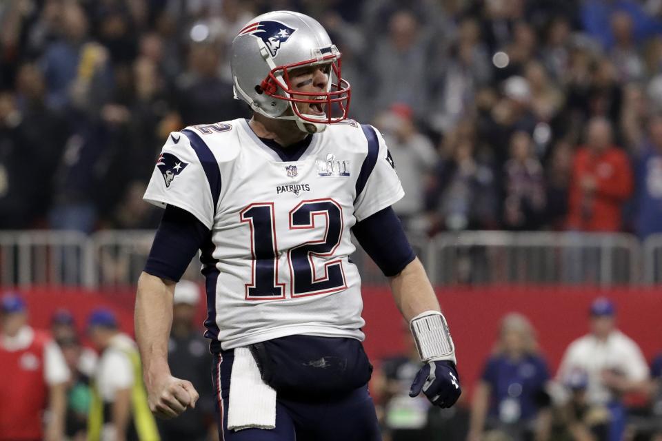 New England Patriots' Tom Brady (12) celebrates a touchdown during the second half of the NFL Super Bowl 53 football game against the Los Angeles Rams, Sunday, Feb. 3, 2019, in Atlanta. (AP Photo/Jeff Roberson)