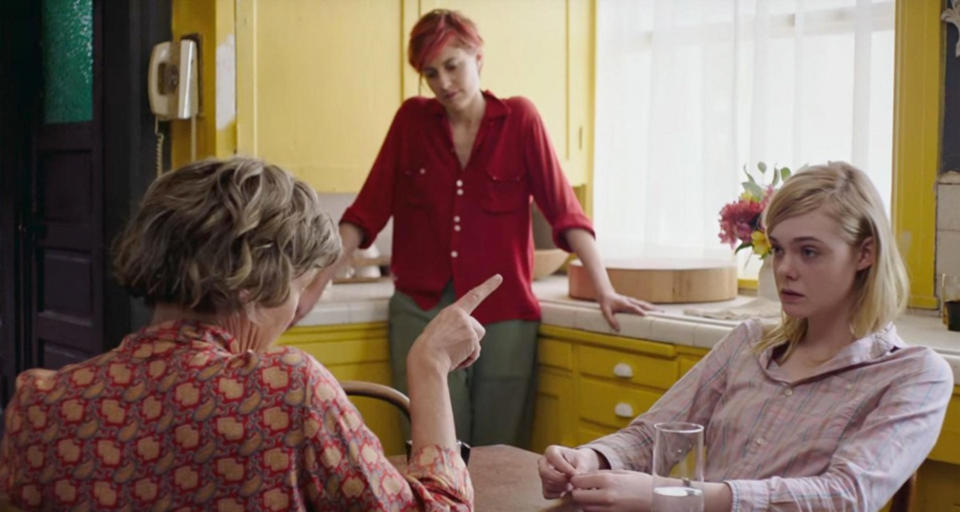 Annette Bening, Greta Gerwig, and Elle Fanning talking in the kitchen.