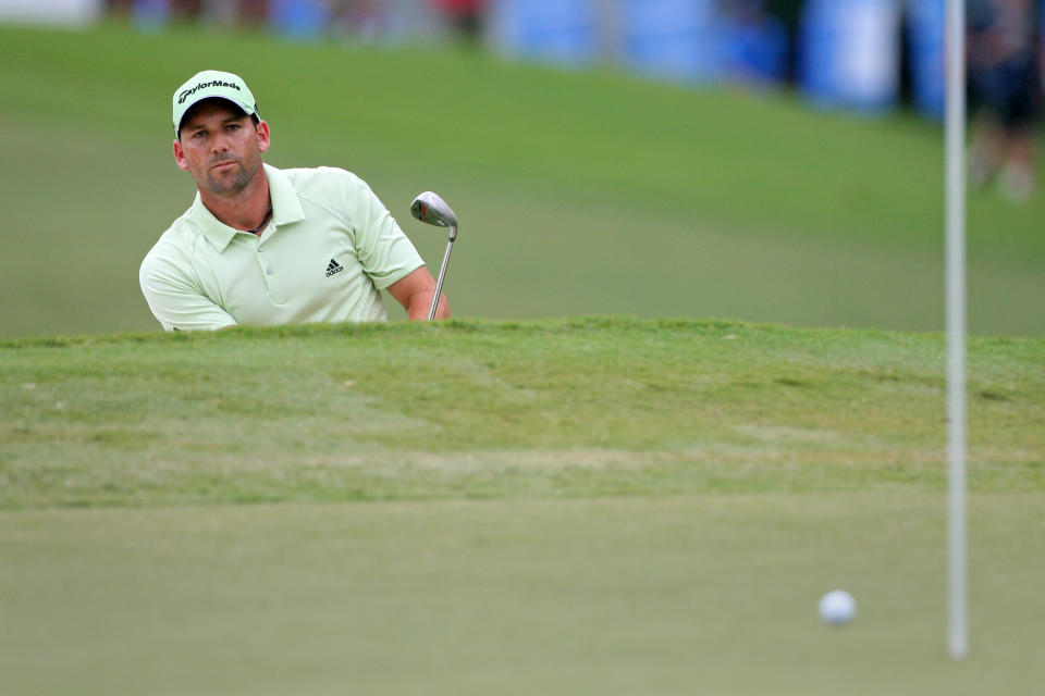GREENSBORO, NC - AUGUST 18: Sergio Garcia of Spain watches his third shot on the 15th hole during the third round of the Wyndham Championship at Sedgefield Country Club on August 18, 2012 in Greensboro, North Carolina. (Photo by Hunter Martin/Getty Images)