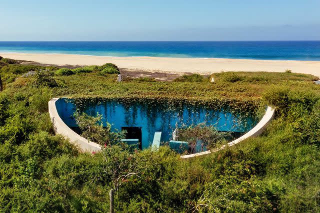 <p>Kenny Viese/Courtesy of Rancho Pescadero</p> At Rancho Pescadero, outdoor showers are screened by trees and vines.