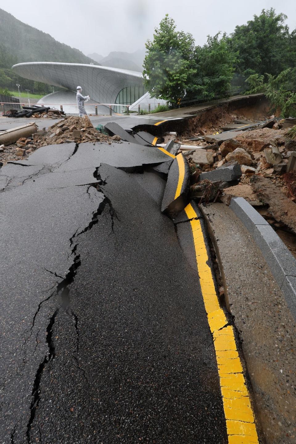 A damaged road inside Seoul National University’s Gwanak Campus in Seoul (EPA)