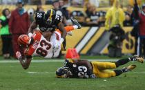 <p>Cincinnati Bengals wide receiver Tyler Boyd (83) is tackled by Pittsburgh Steelers safety Sean Davis (28) and safety Mike Mitchell (23) during the second half at Heinz Field. The Steelers won the game, 24-16. Mandatory Credit: Jason Bridge-USA TODAY Sports </p>