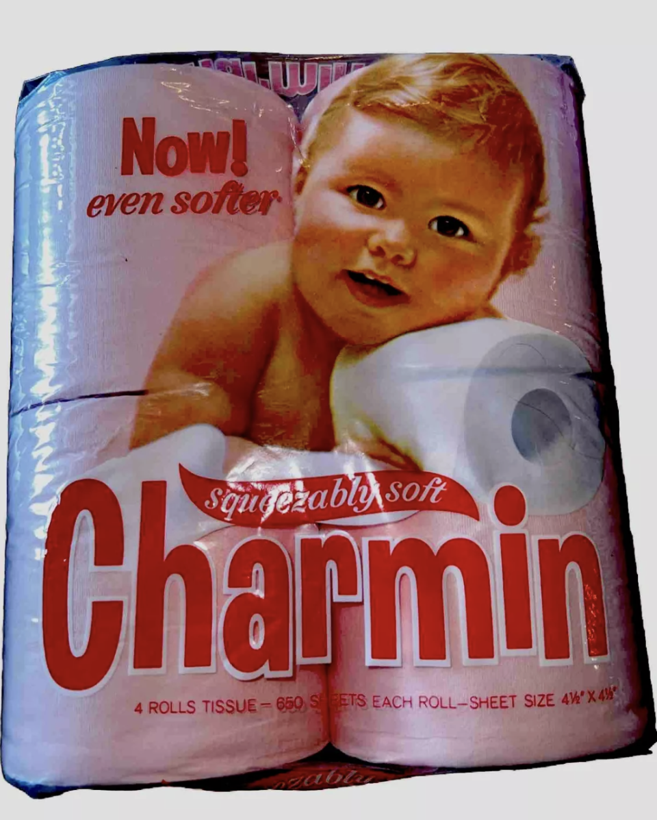 Package of Charmin toilet paper featuring a baby and the text 