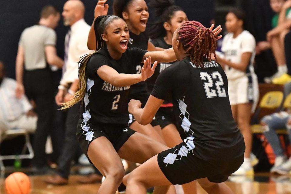 Hillside’s Taylor Barner (2) and Amira Ofunniyn (22) celebrate after their team’s defeat of Hilside in the East Regional Finals. The Hillside Hornets and the Panther Creek Catamounts met in the NCHSAA 4A East Regional Finals in Sanford, N.C. on March 4, 2023.
