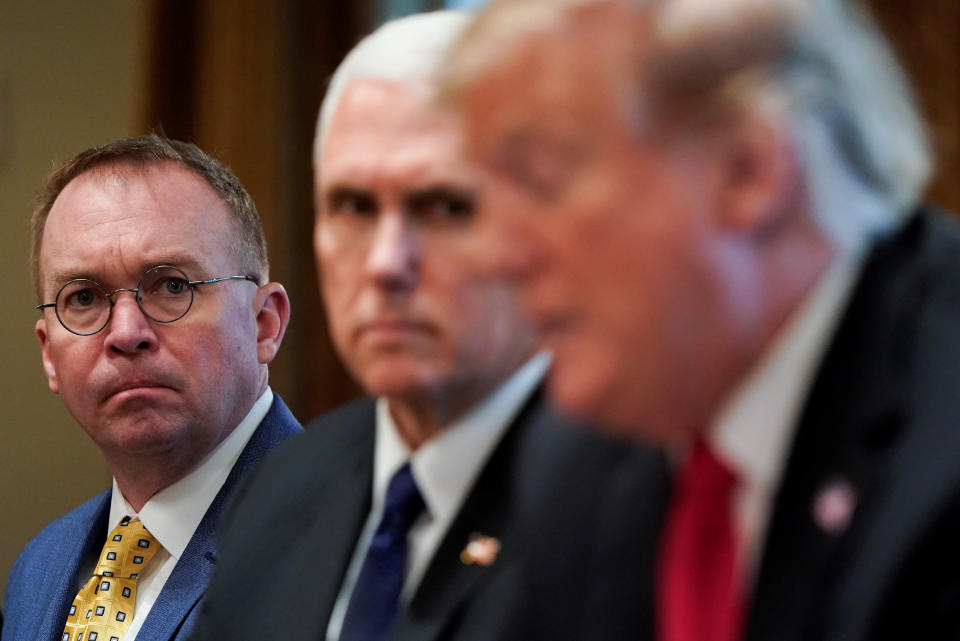 White House Acting Chief of Staff Mick Mulvaney and Vice President Mike Pence listen as President Donald Trump speaks during a meeting in the Oval Office, April 2, 2019. (Joshua Roberts/Reuters)